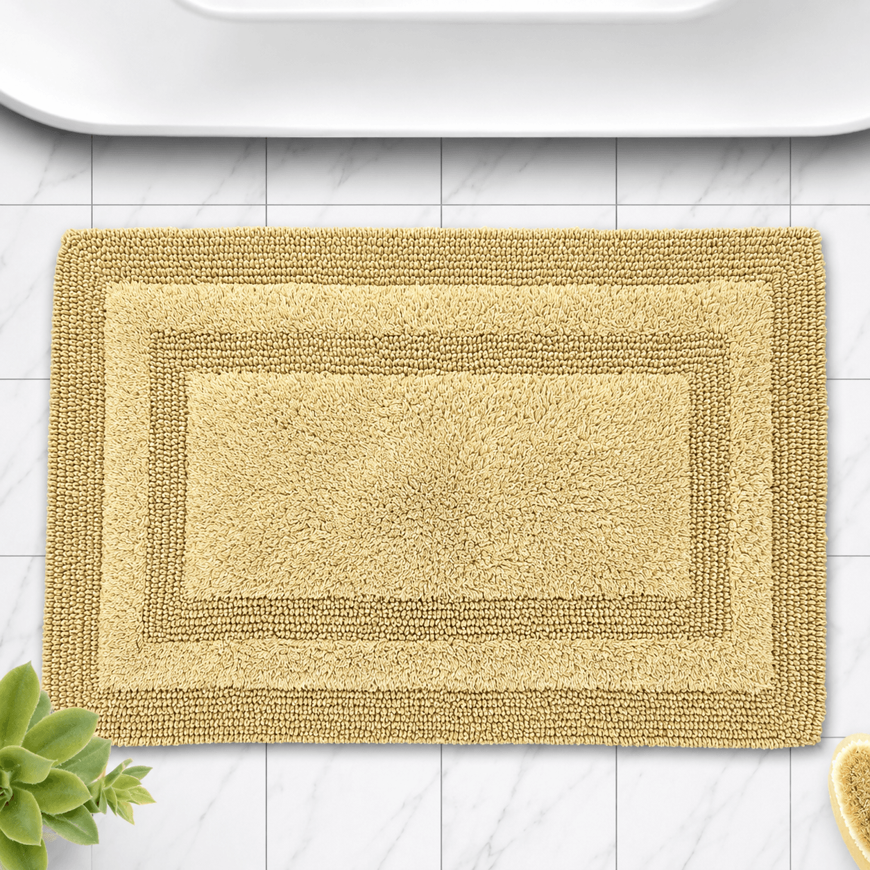 Plush Beige Bath Mat with Border Design