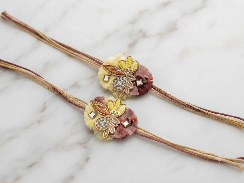 Exquisite Designer Gold-Plated Thread Rakhi Set with Floral and Pearl Detailing | Premium Rakshabandhan Gift