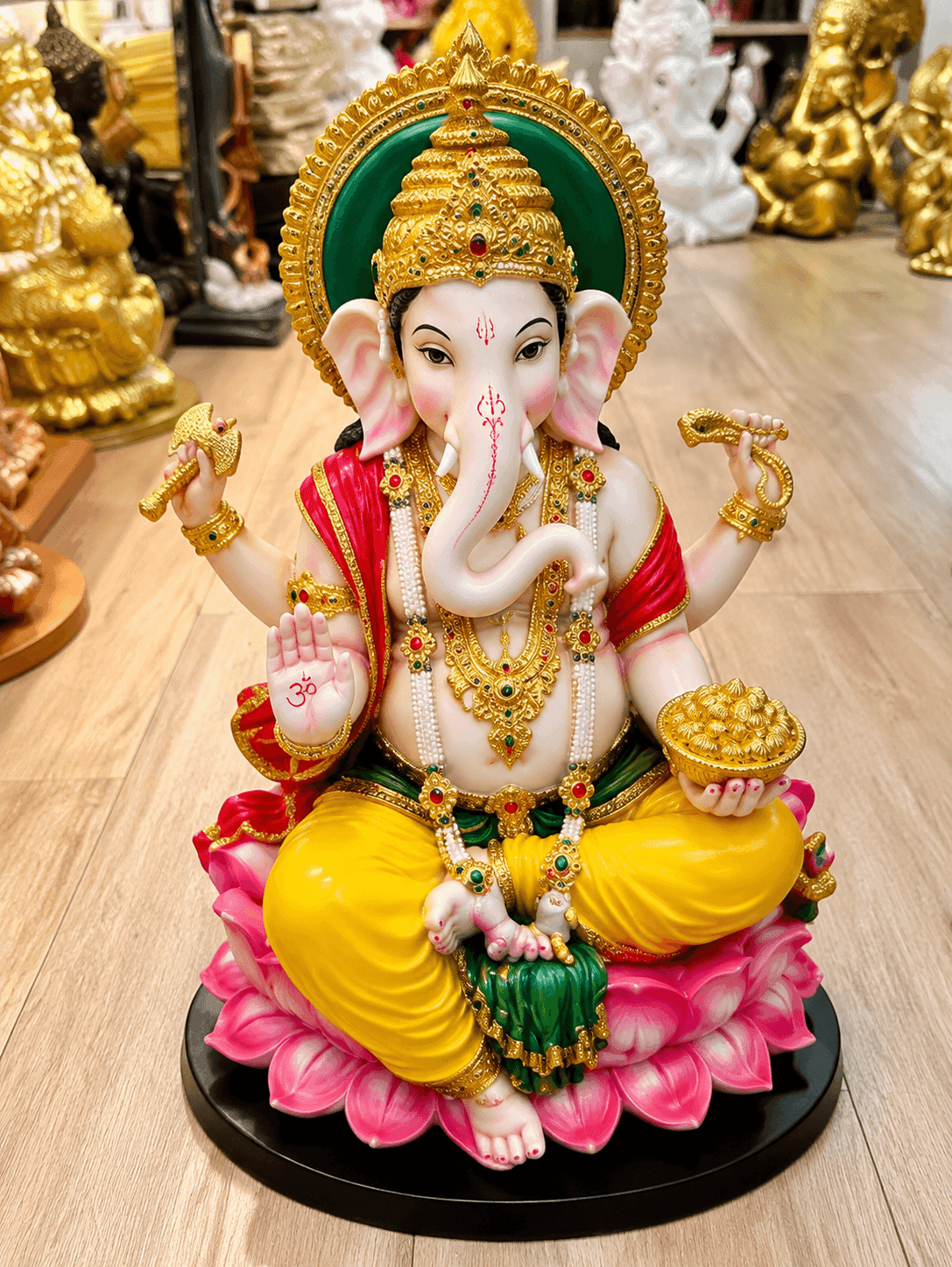 Lala G Royal Ganesha Idol with Golden Crown & Lotus Throne for Home Decor daily essentials & lifestyle