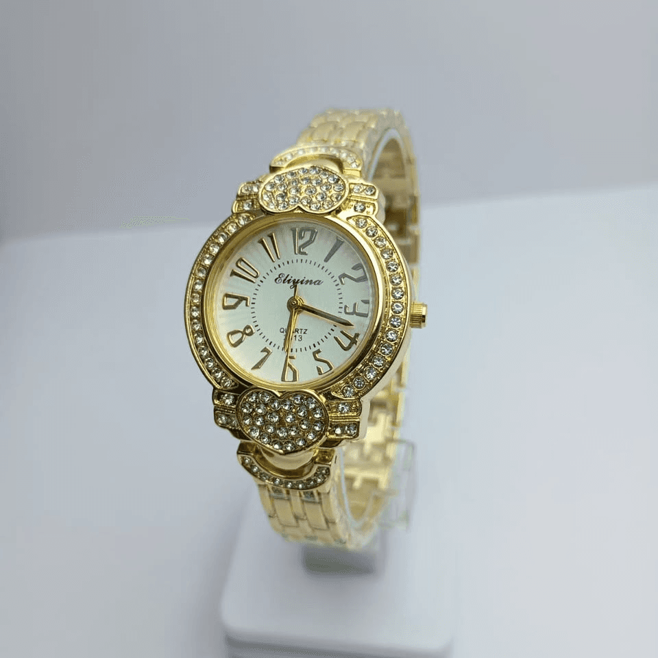 Luxury Gold Crystal Women’s Watch – White Dial, Sparkling Rhinestone Bezel, Heart-Shaped Crystal Details & Gold-Tone…